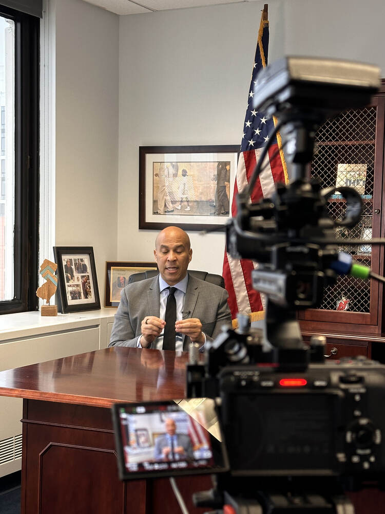 A public official interviewed on camera in the studio